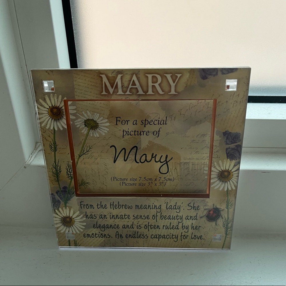 Mary photo holder with magnetic strip